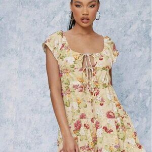 WOVEN SMOCK DRESS IN FLORAL with a scoop neck